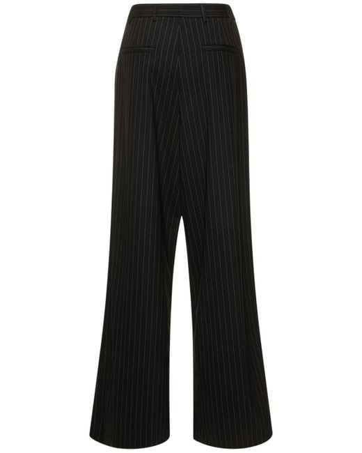 Pantalones anchos de lana stretch GIUSEPPE DI MORABITO de color Black