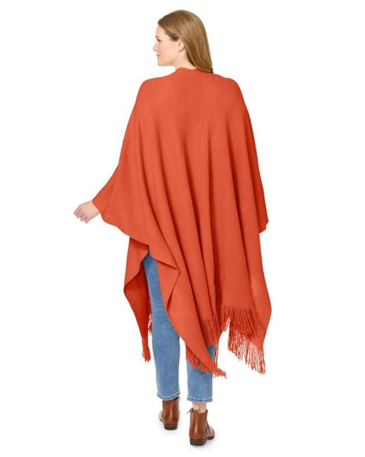 Woman Within Red Within Fringed Cape