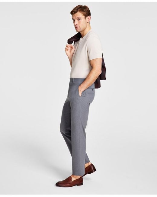 Michael Kors White Solid Classic Fit Pants for men