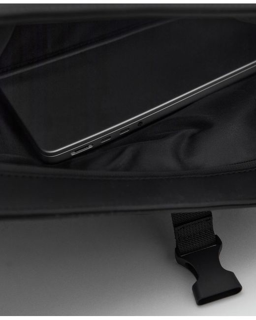 Mango Black Flap Closure Rubberized Backpack
