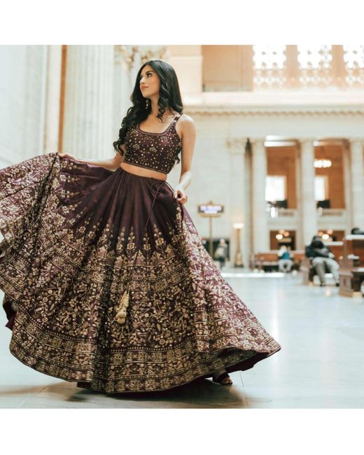 Ras Brown Raw Silk Lehenga Choli Set With A Cluster Of Multi Colored Resham Flowers And Cut Dana Embroidery