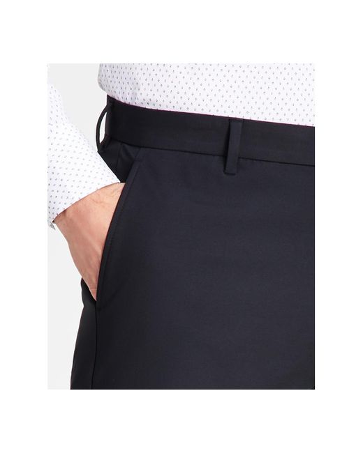 Michael Kors White Classic Fit Flat Front Pants for men