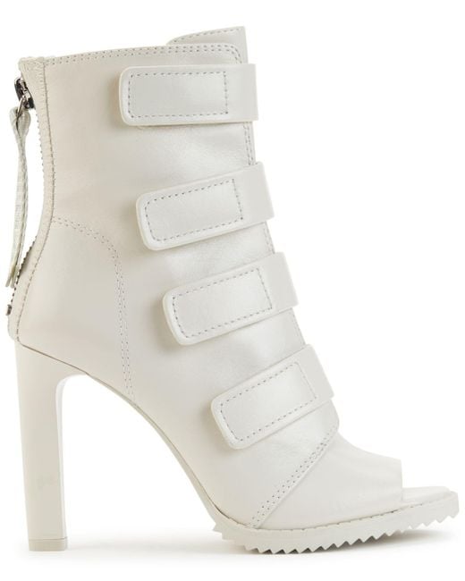 DKNY Leather Blake Lug Sole Peep-toe Booties - Lyst