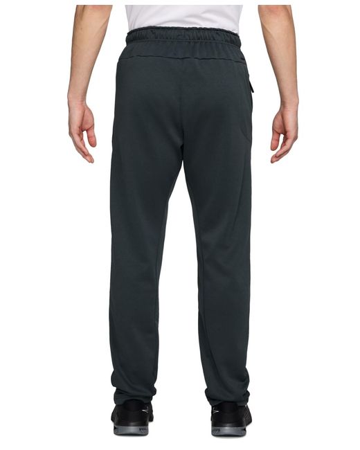 Nike Black Relaxed-fit Therma-fit Open Hem Fitness Pants for men