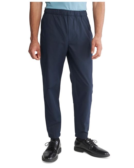 Calvin Klein Blue Tech Slim-fit Solid Drawstring Pants for men