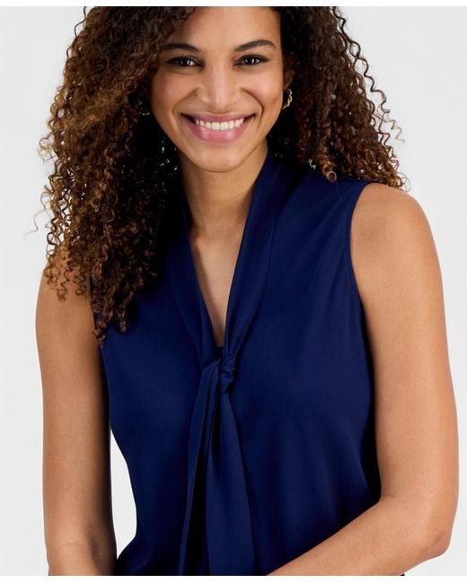 Kasper Blue Solid Sleeveless Tie-neck Blouse