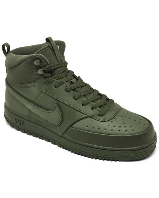 green nike boots men