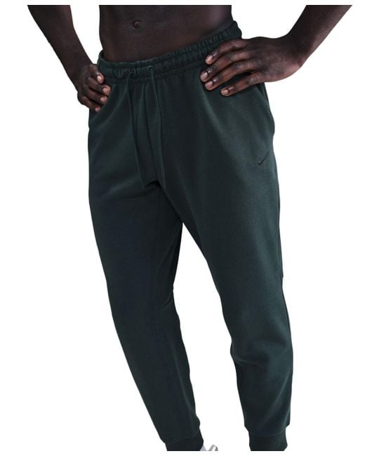 Nike Black Primary Dri-fit Uv Versatile joggers for men