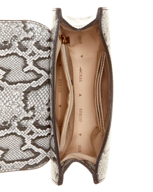 Guess Fleet Mini Python Print Saddle Crossbody Bag in White | Lyst