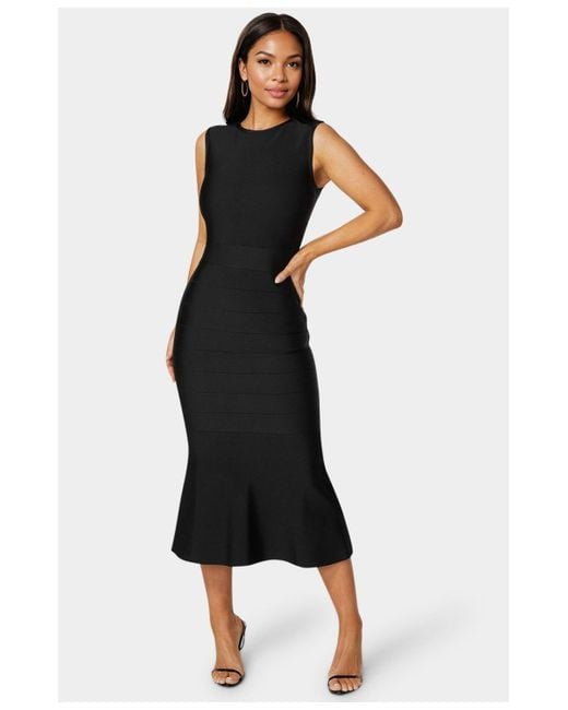 Bebe Cap Sleeve Bandage Flounce Dress in Black | Lyst