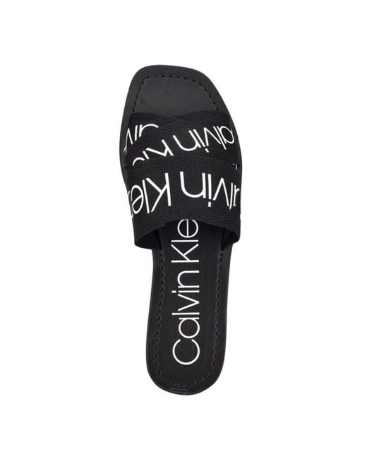 Calvin Klein Bainy Criss-cross Strap Slides Flat Sandals in Black 