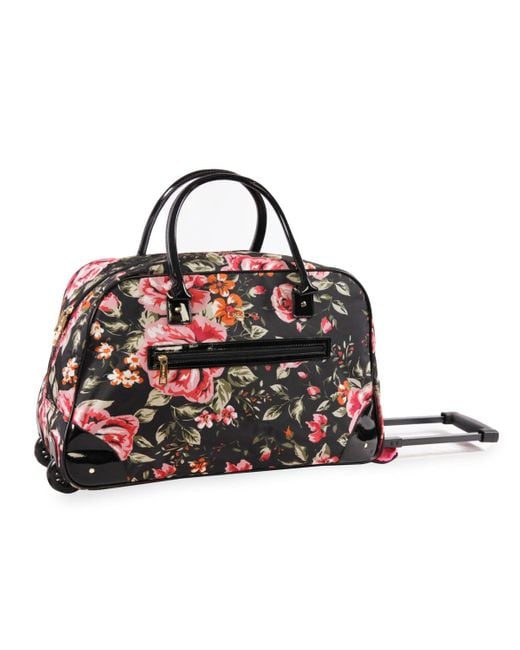 Bebe Giselle Rolling Duffel Bag in Black Lyst