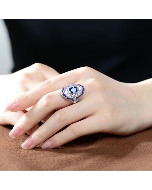 Genevive Jewelry Blue Sterling Silver Radiant And Baguette Cubic Zirconia Coctail Ring
