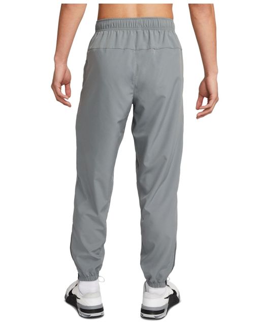 Nike Gray Form Dri-fit Standard-fit Tapered-leg Training Pants for men