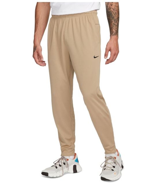 Nike Black Totality Dri-fit Tapered Versatile Pants for men