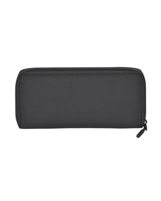 ROOTS Black Slim Zipper Round Wallet for men