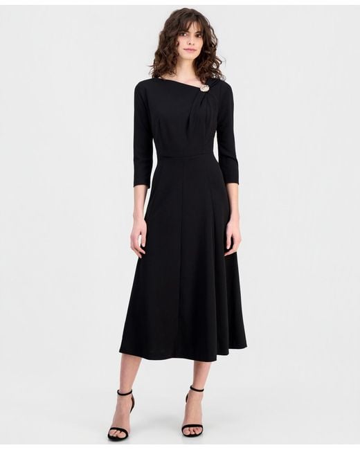 anne klein black dress Women's Keyhole Cap Sleeve Sheath Size 10 this tailored sheath is all about clean lines and flattering details Anne Klein Faux Wrap Mini