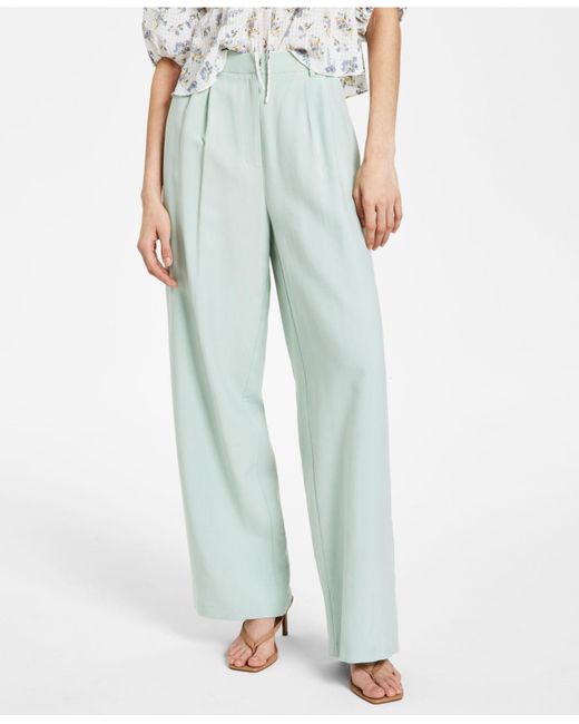 Lucy Paris Synthetic Pleated Wide-leg Pants - Lyst