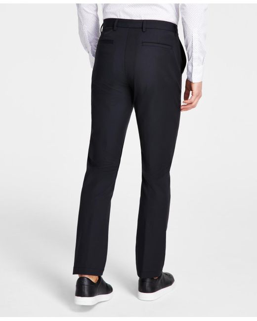 Michael Kors White Classic Fit Flat Front Pants for men