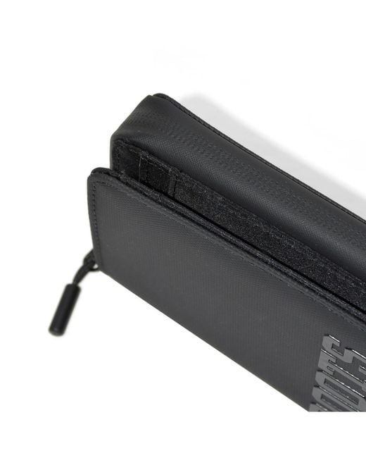 ROOTS Black Compact Zip Around Snap Wallet for men