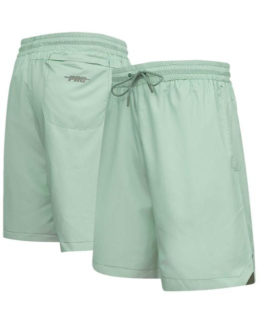 Pro Standard Green Dallas Cowboys Neutrals 2.0 Woven Shorts for men