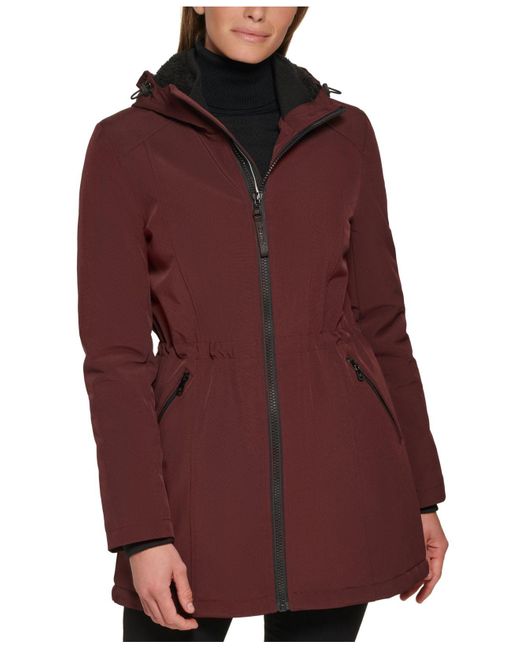 calvin-klein-hooded-faux-fur-lined-anorak-raincoat-in-red-lyst