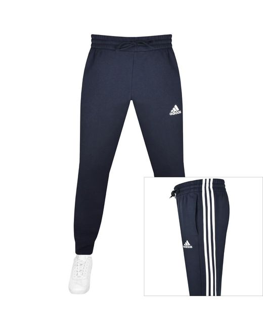 Adidas Originals Blue Adidas Essentials 3 Stripes joggers for men