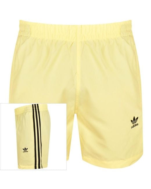 Adidas Originals Yellow Adidas Three Stripes Swim Shorts for men