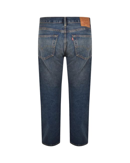 Levi's Blue 501 Original Fit Mid Wash Jeans for men