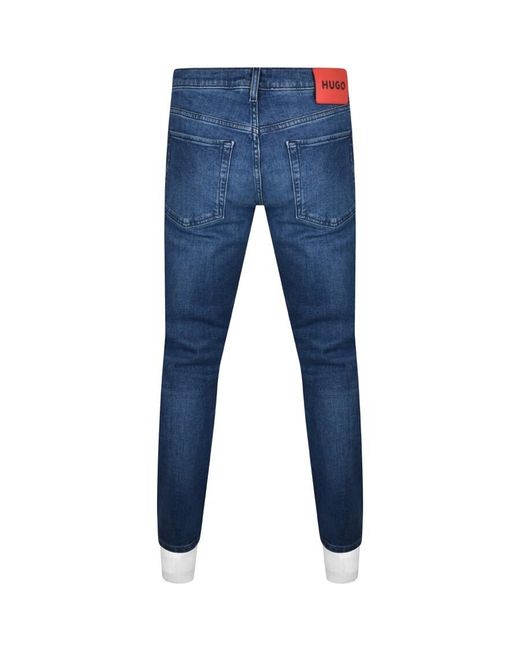 HUGO Blue 634 Tapered Fit Mid Wash Jeans for men