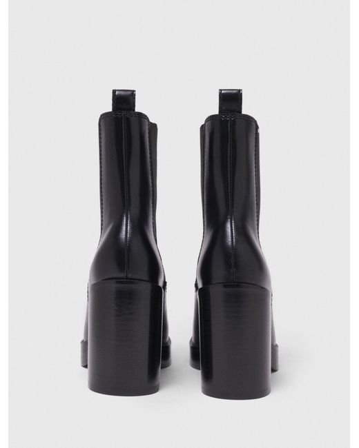 Bottines Chelsea À Talon En Cuir Maje en coloris Black