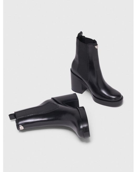 Bottines Chelsea À Talon En Cuir Maje en coloris Black