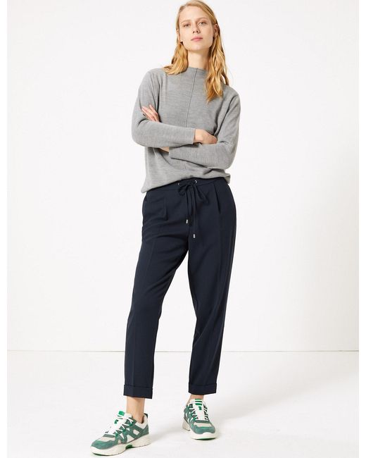 blue ankle grazer trousers
