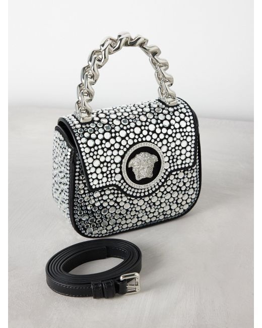 handel overloop moe Versace La Medusa Mini Crystal-embellished Leather Bag in White | Lyst