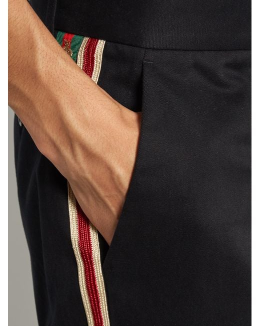 navy trousers with side stripe