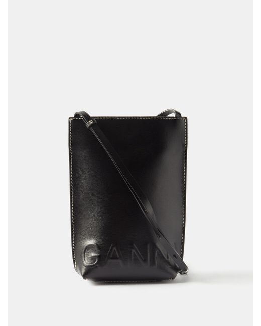 Ganni Banner Small Logo-embossed Recycled-leather Bag in Black | Lyst ...