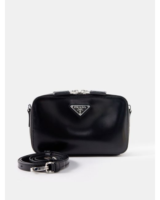 Prada Triangle Logo plaque Leather Crossbody Bag in Black for Men