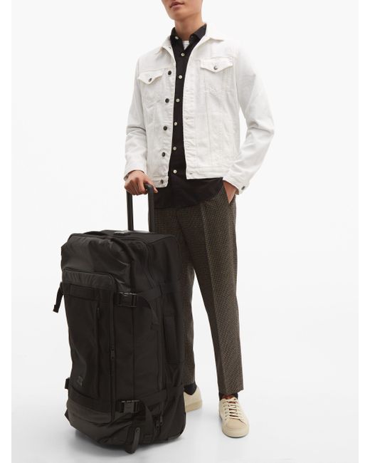 eastpak tranverz l suitcase