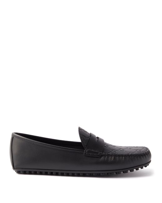 Gucci Monogram-debossed Leather Loafers in Black for Men - Lyst