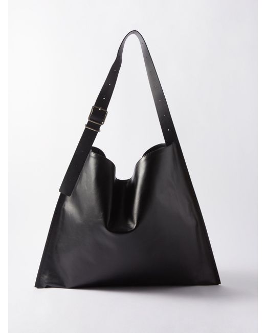 メンズ Jil Sander ベルトストラップ レザーバッグ ブラック | Lyst