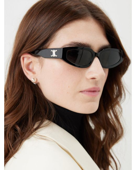 Women Glossy Black Chunky Oval Sunglasses | Stella McCartney US