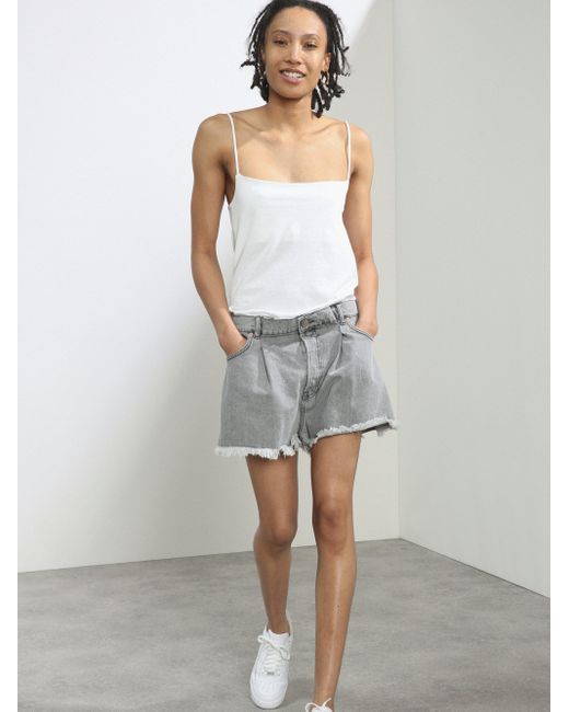 Raey Fold Raw-hem Denim Shorts in Light 
