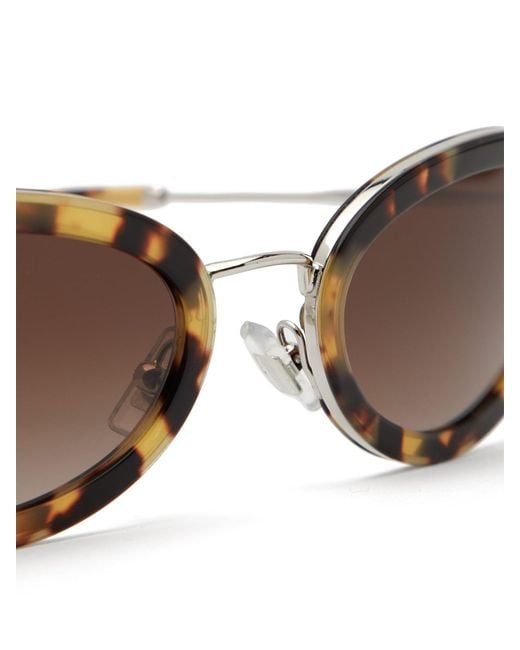 Miu miu hotsell delice sunglasses