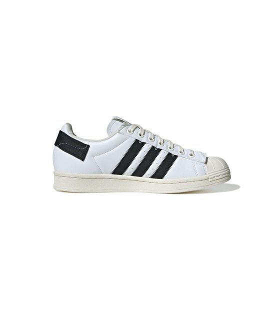 buy white adidas sneakers
