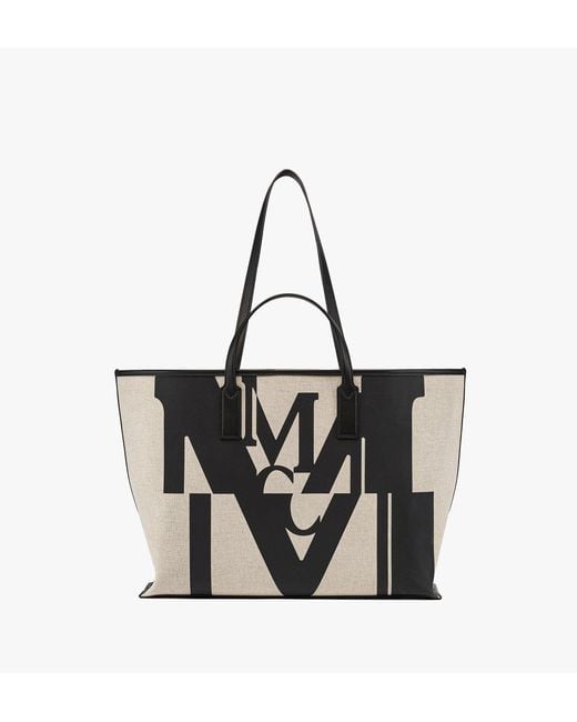MCM Aren Shopper In Logo Glitch Canvas in Black | Lyst UK