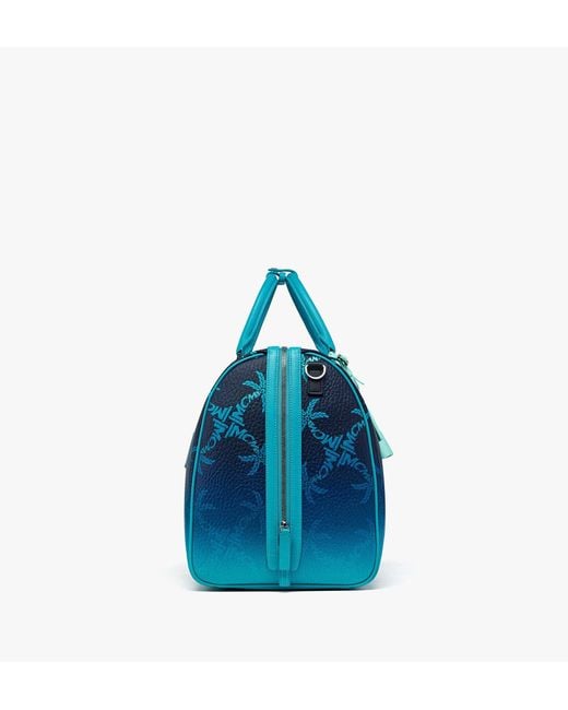 MCM Blue Ottomar Weekender Bag In Gradation Palm Canvas for men