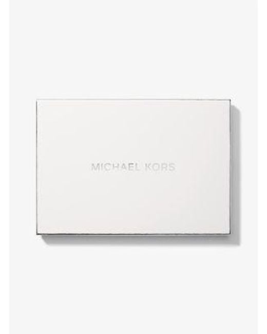 MICHAEL Michael Kors White Mk Large Metallic Pebbled Leather Wristlet