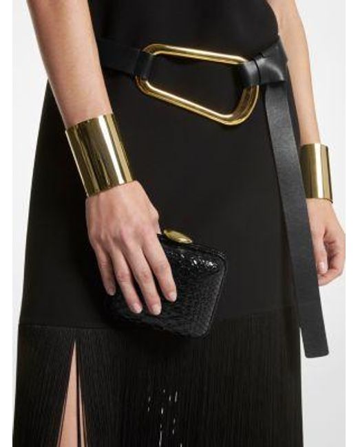 Bolso minaudière Tina mini de piel con motivo de pitón en relieve Michael Kors de color Black