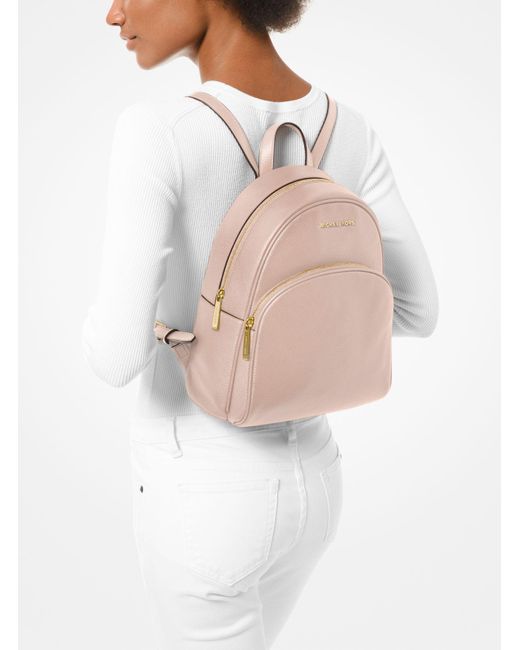 Michael Kors Abbey Medium Pebbled Leather Backpack in Soft Pink (Pink) |  Lyst