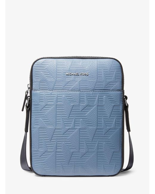 Michael Kors Cooper Logo Embossed Leather Flight Bag in Denim (Blue